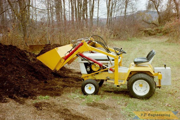Paul F. of Amherst, MA (hey that's me!) built this loader for his cub cadet 149 garden tractor in 1998 and soon after began selling plans to the public as p.f.engineering | Cub Cadet 149 Garden Tractor Loader_1