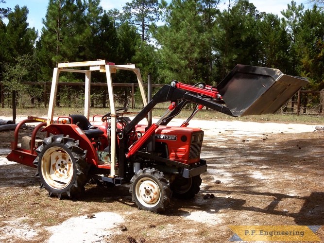 Sam D. in Camden South Carolina - Yanmar YM1720D with front end loader | Yanmar YM1720D by Sam D. in Camden, S.C. with p.f.engineering front end loader bucket lifted