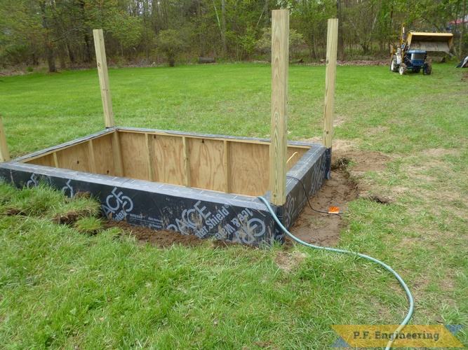 DIY - Palram Greenhouse Project | backfilling the outside with dirt. palram 6 x 10 greenhouse project