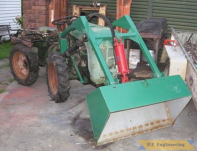 an older articulated tractor made by Holder co. down in Australia with a P.F. Engineering loader mounted to it | Holder Articulated tractor loader_1
