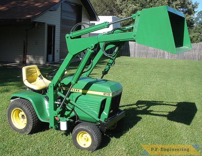 Joe B. in Vicksburg, MS built this front end loader for his John Deere 210 Garden tractor. that's a lot of green! great work Joe! | John Deere 210 Garden Tractor Loader_3