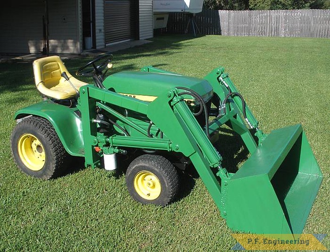 Joe B. in Vicksburg, MS built this front end loader for his John Deere 210 Garden tractor. that's a lot of green! great work Joe! | John Deere 210 Garden Tractor Loader_4