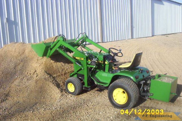 Al Z. from Brownton, MN built this loader for his John Deere 400 Garden Tractor here seen with weight box typically holding 350 lbs of stone when full | John Deere 400 Garden Tractor Loader_1