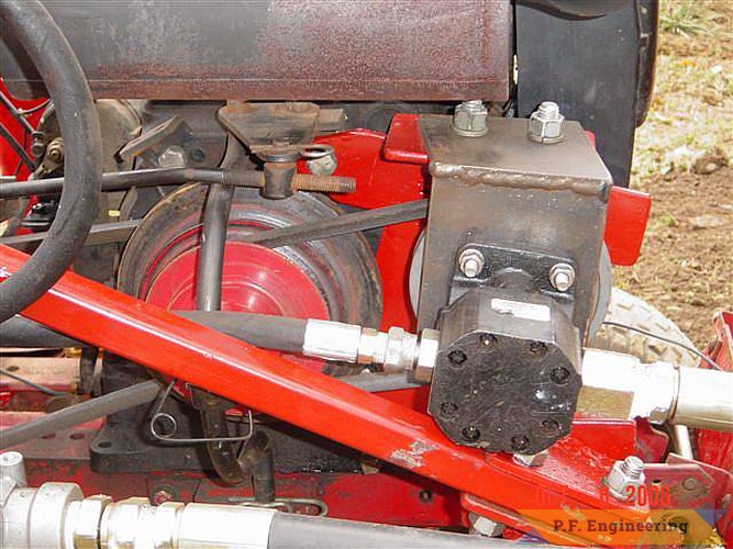 the Wheel Horse garden tractors require a side mount pump orientation via bracket that bolts directly to the engine case | Wheel Horse 310-8 garden tractor loader_1