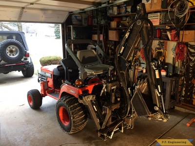 Kubota BX2200 micro hoe on the tractor by Mark J.