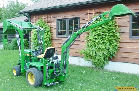 John Deere 318 Micro Hoe Loader rear view by Walter K., Pointe Claire, Quebec, CN