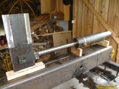 log splitter cylinder rod clevis on the wedge